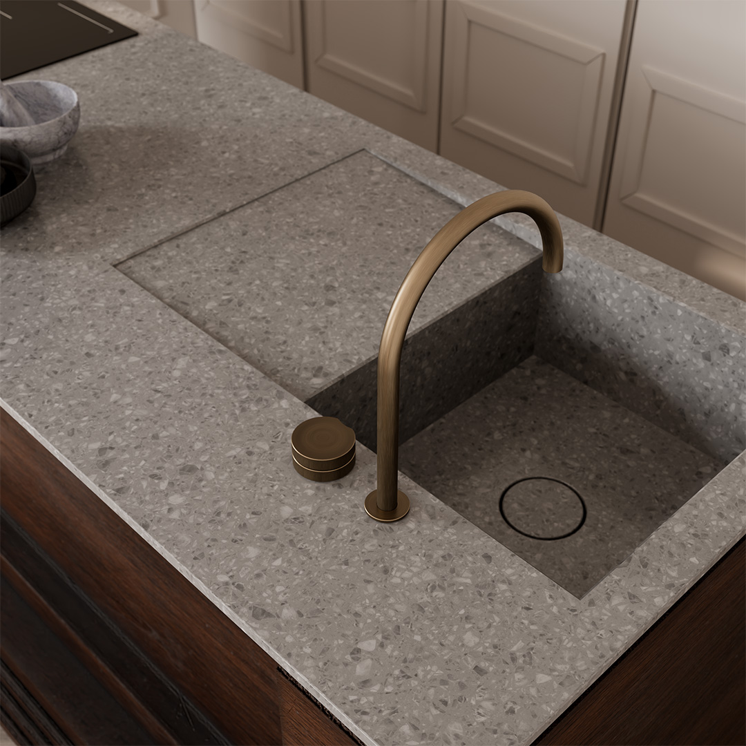 Lavello integrato in terrazzo e rubinetteria in ottone